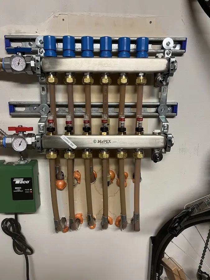 Plumber performing Gas Line Installation at a residential property in Lake Wissota